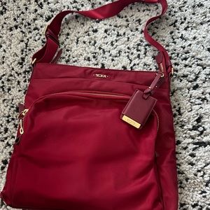Tumi Voyageur Crossbody in Berry